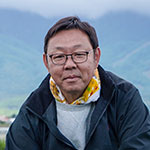 笑顔を見せる村上さん